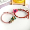 Factory direct sales of the popular new solid-color flower bow hair band in Korean style. Cute girls, elastic and won't damage hair Specification image
